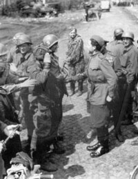 American and Soviet troops meet in April 1945, east of the Elbe River.