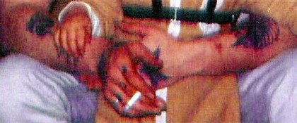Tattoos on David Burrell's Left arm. Photograph taken about 1972.